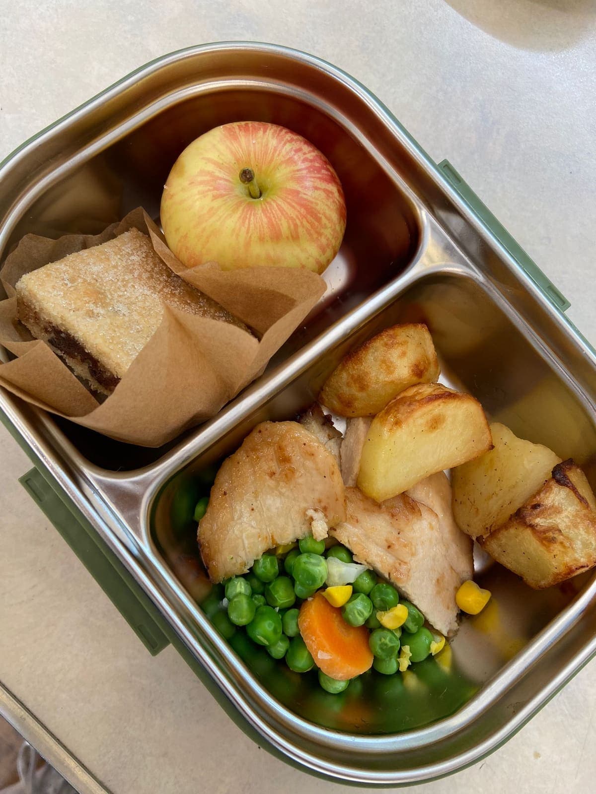 A MunchBox lunch with apple and flapjack